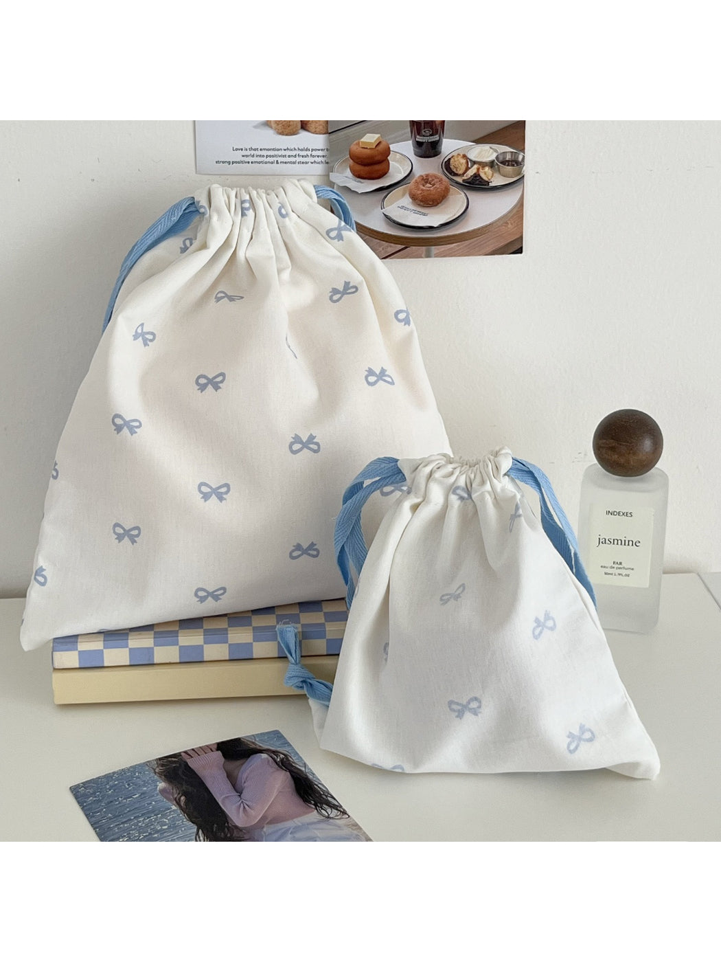 Close-up of Cosbai bow pattern on drawstring pouch fabric