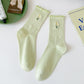 Rufia - Floral Embroidered Ruffled Mid-Calf Socks
