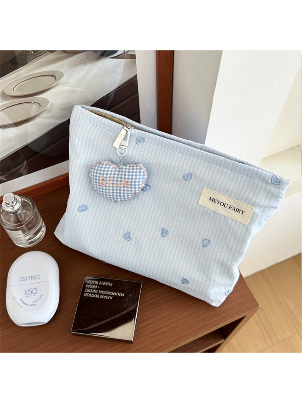 Cosbai heart pattern cosmetic bag standing upright on white surface