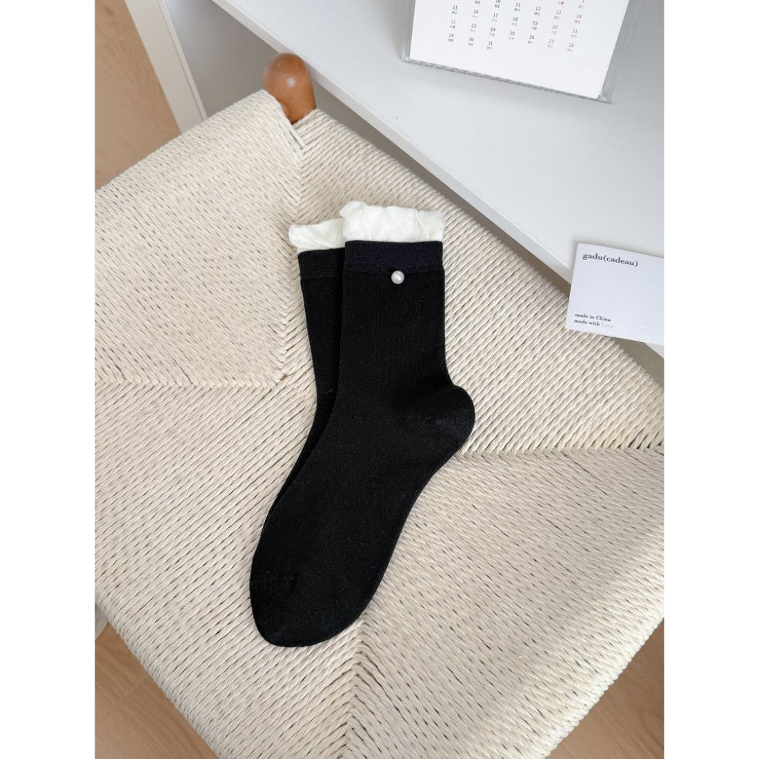 Rufia ribbed crew socks styled with rolled-up jeans and sneakers