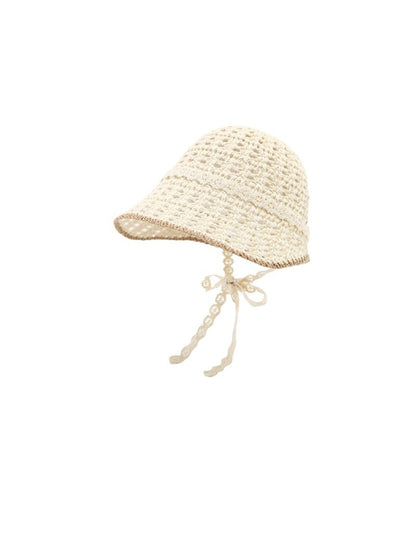 Haila lace trim knit bucket hat with tie straps styled on a mannequin head