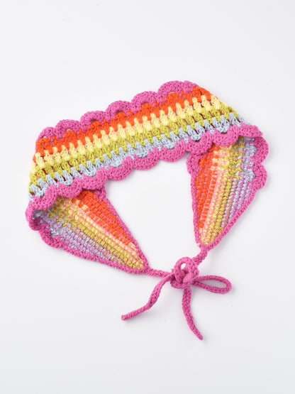 Side view of crochet flower hairband showing detailed stitching and flower arrangement