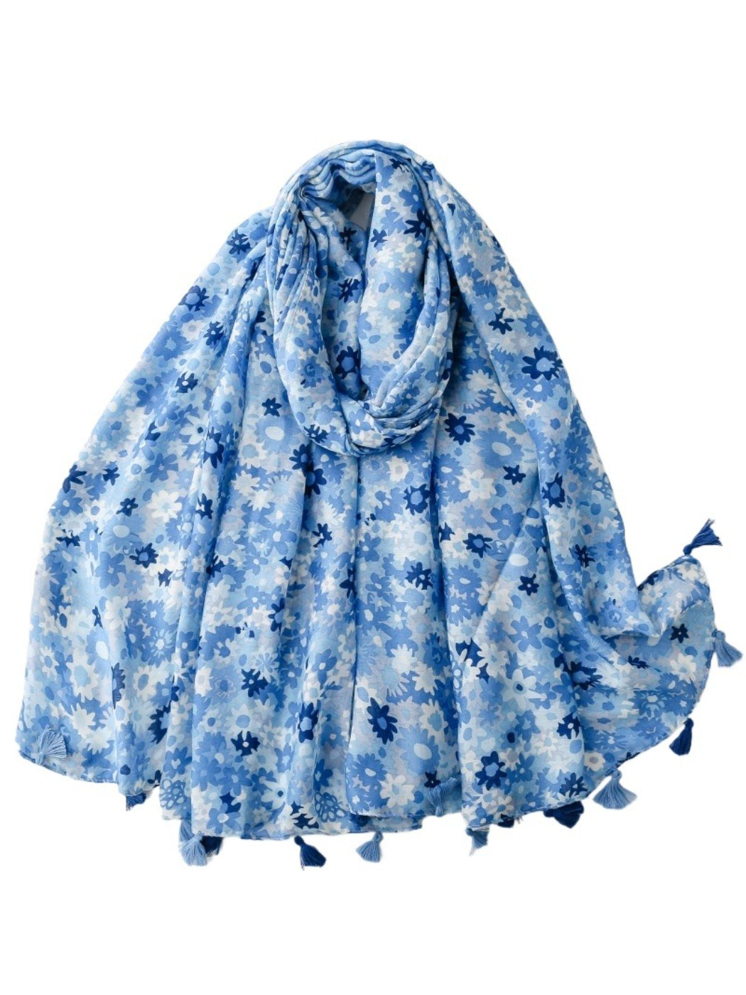 Close-up of bright ditsy floral pattern on lightweight wrap scarf