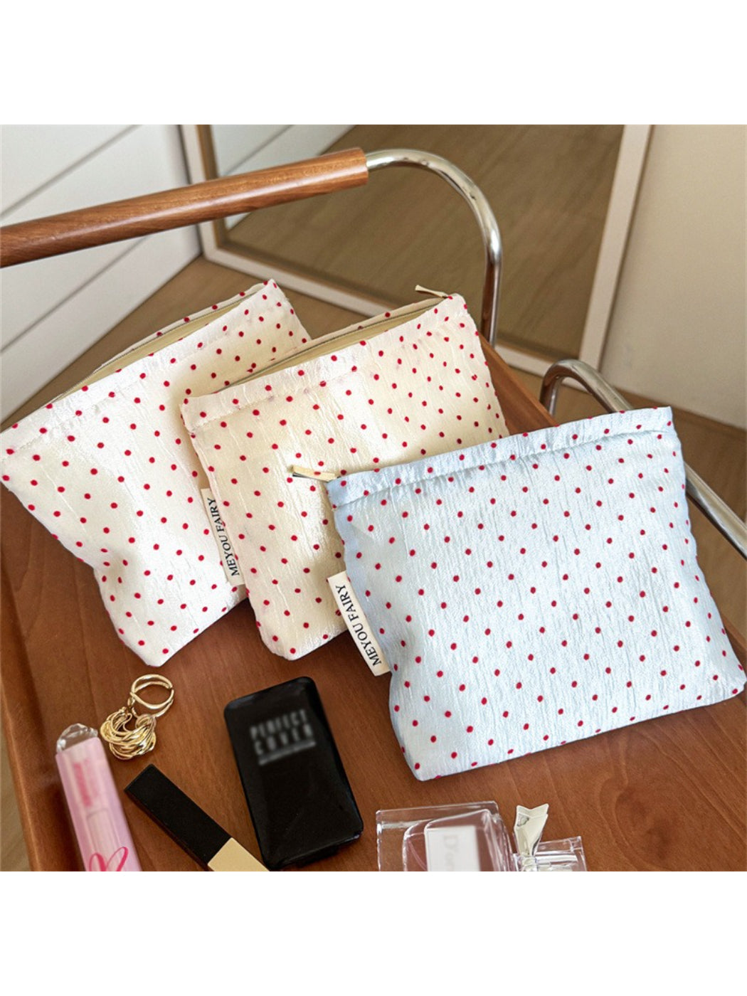 Cosbai Red Dot Cosmetic Bag front view with red dot pattern on white background