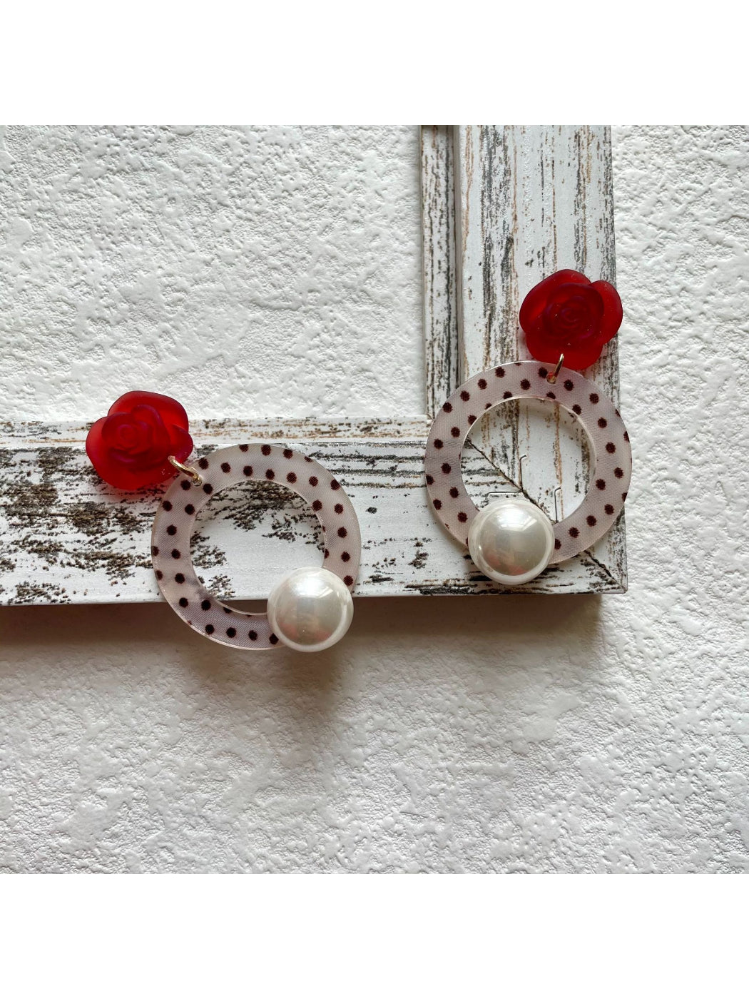 Earwish Polka Dot Ring Drop Earrings worn on ear, highlighting drop style