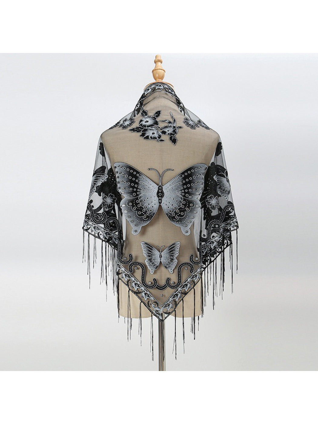 Model wearing Scarvii Butterfly Fringe Triangle Scarf styled around the neck with fringes visible