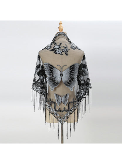 Model wearing Scarvii Butterfly Fringe Triangle Scarf styled around the neck with fringes visible