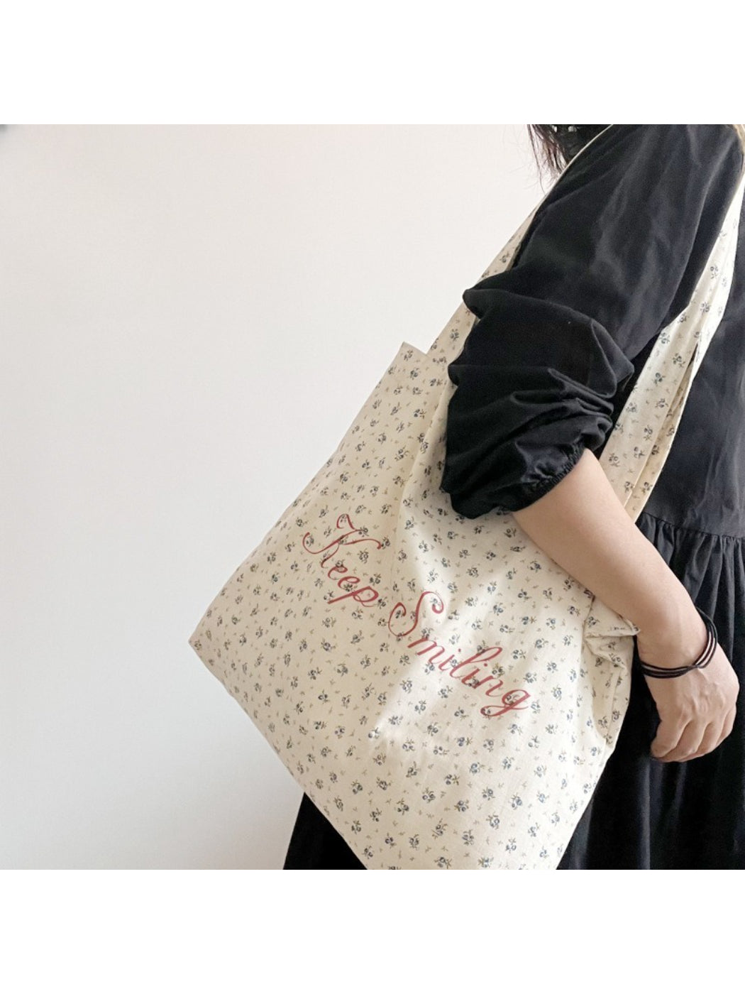 Cosbai vintage floral tote bag with colorful flower print and lettering on beige fabric