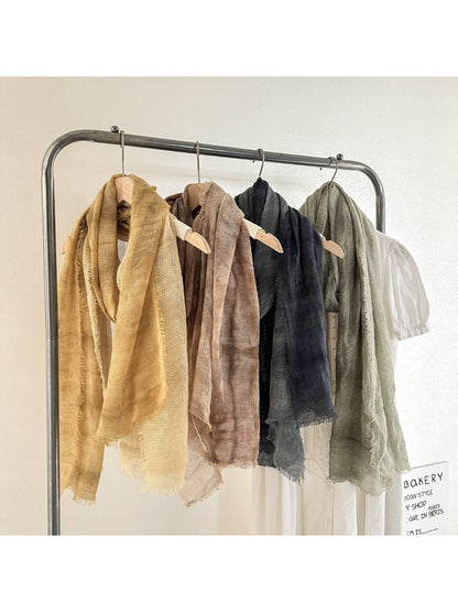 Scarvii lightweight woven scarf in beige with fringed edges displayed flat