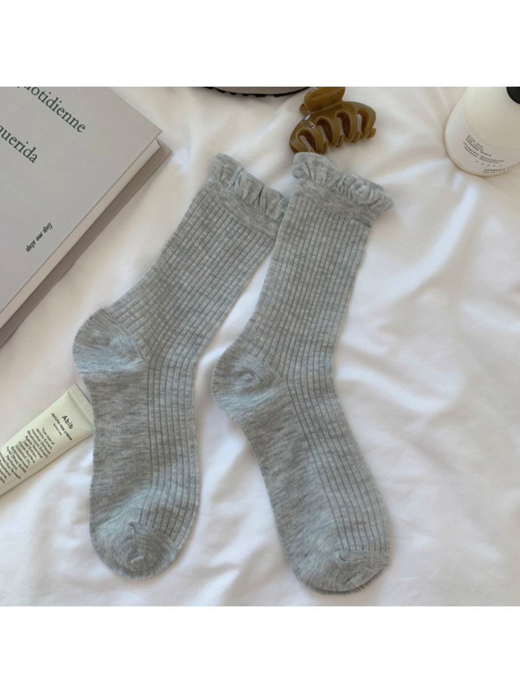 Model wearing Rufia simple lace trim crew socks with skirt