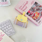 Cosbai mini polka dot pouch bag showing interior lining and zipper