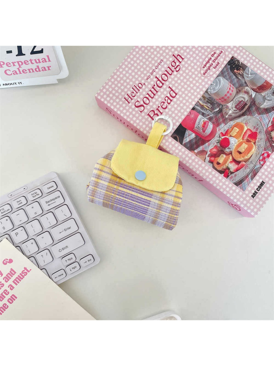 Cosbai mini polka dot pouch bag showing interior lining and zipper
