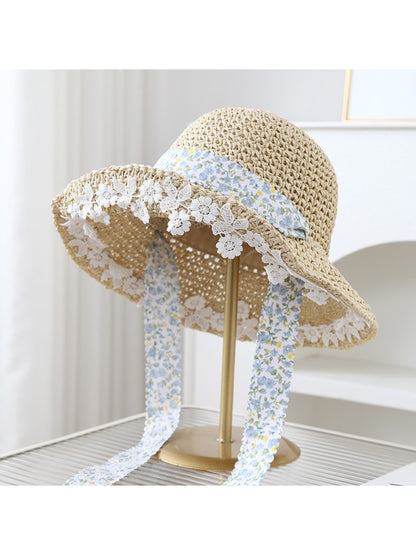 Haila lace trim floral band bucket hat angled to show overall shape and decorative elements