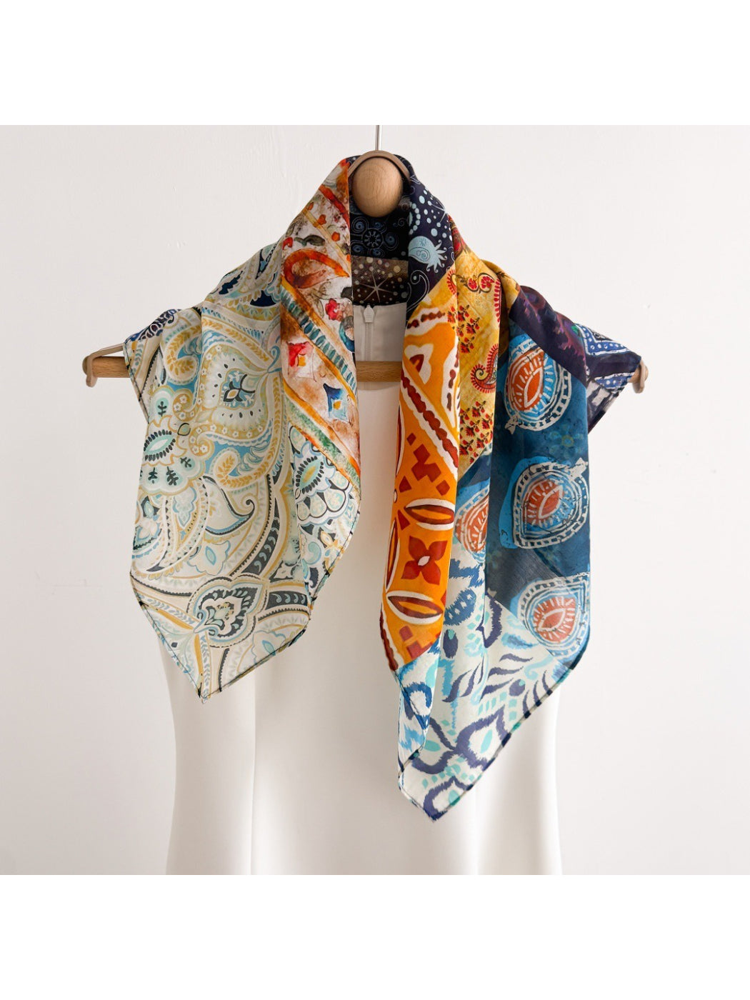 Scarvii boho patchwork print square scarf folded on white background