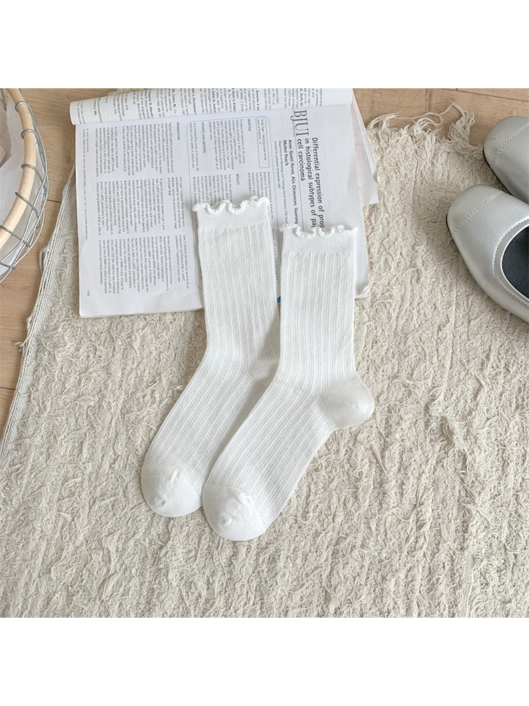 Model wearing Rufia soft frill trim crew socks styled with casual shoes