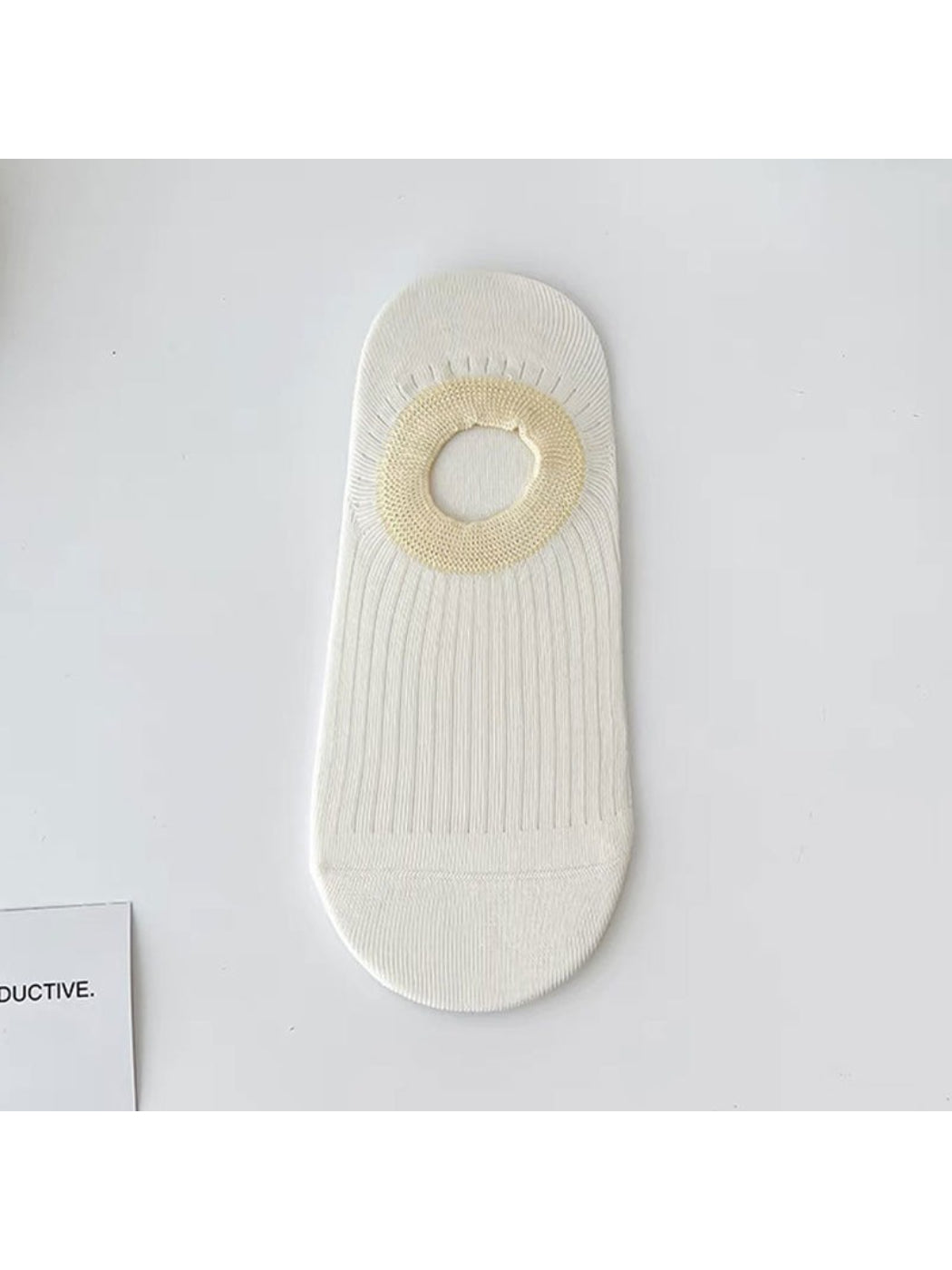 Side view of Rufia low cut everyday socks on a foot