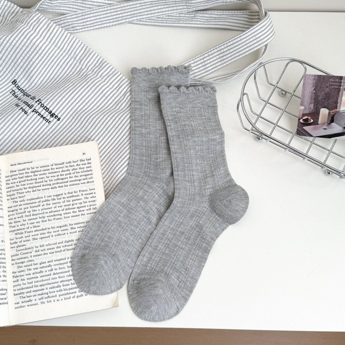 White crew socks with ruffle trim folded neatly