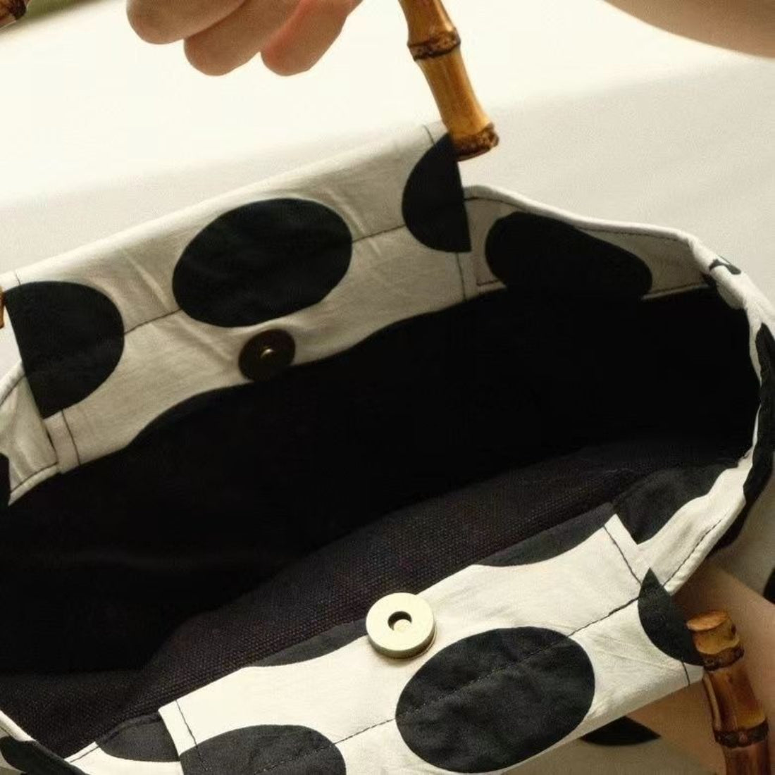 Close-up of Cosbai Retro Polka Dot Shopper Bag handles and fabric texture