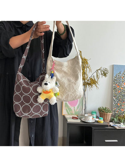 Side view of Cosbai slouch tote bag highlighting its spacious interior
