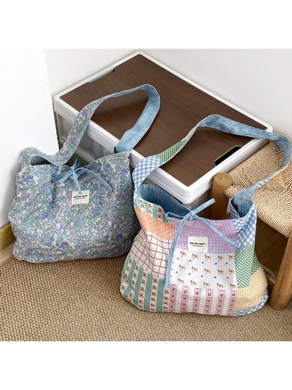 Close-up of patchwork details and stitching on Cosbai slouchy shoulder bag