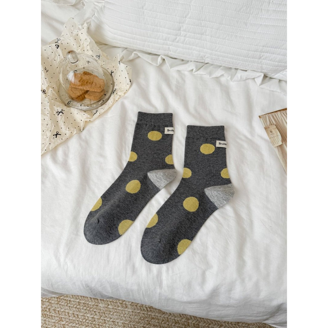 Rufia contrast heel socks paired with casual shoes highlighting the dot pattern