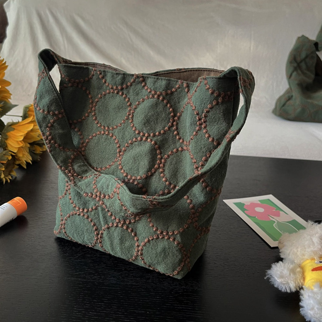 Back view of Cosbai Olive Stitch Slouchy Shoulder Bag highlighting smooth leather surface