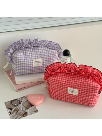 Cosbai ruffle trim gingham makeup bag in black and white check pattern, front view