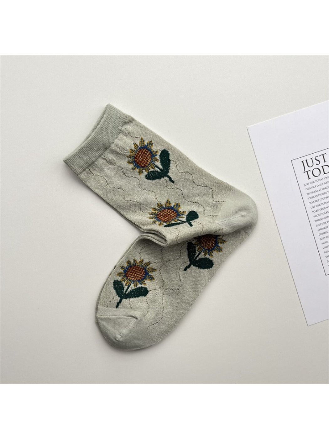 Rufia crew socks in blue floral styling