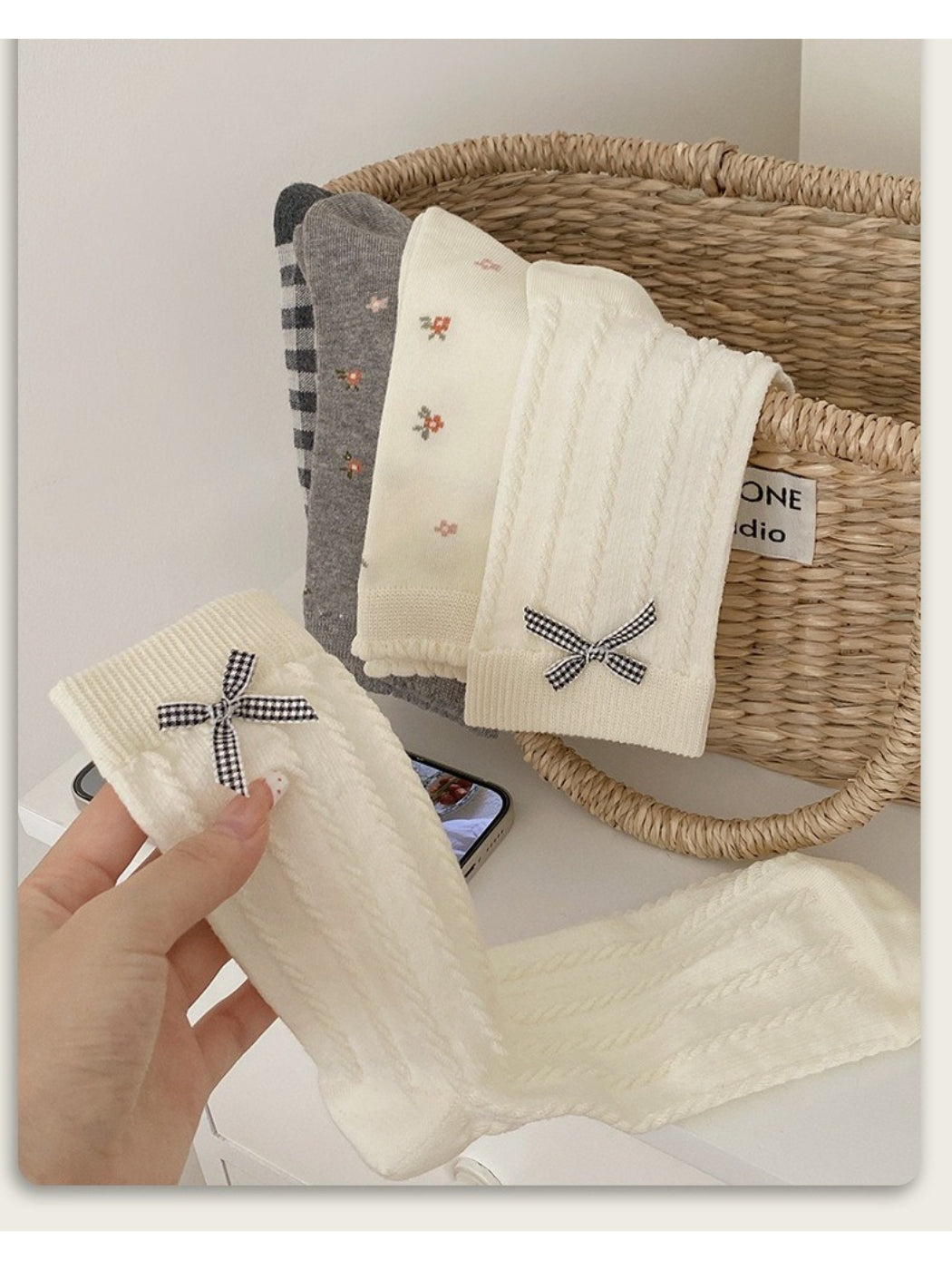 Flat lay of Rufia Classic Bow Trim Crew Socks showing full length and bow detail