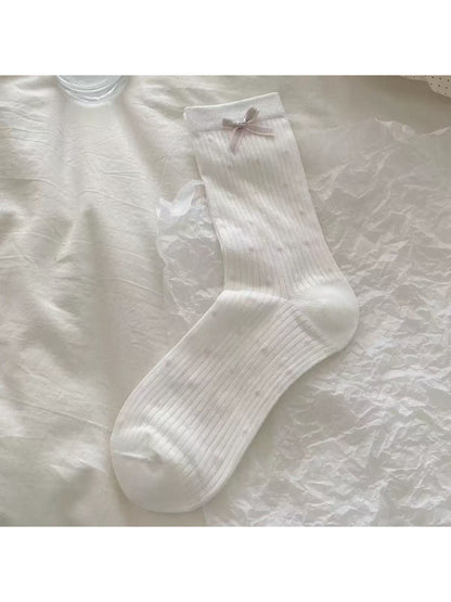 Rufia Romantic Bow Texture crew socks folded to show bow accent and knit pattern