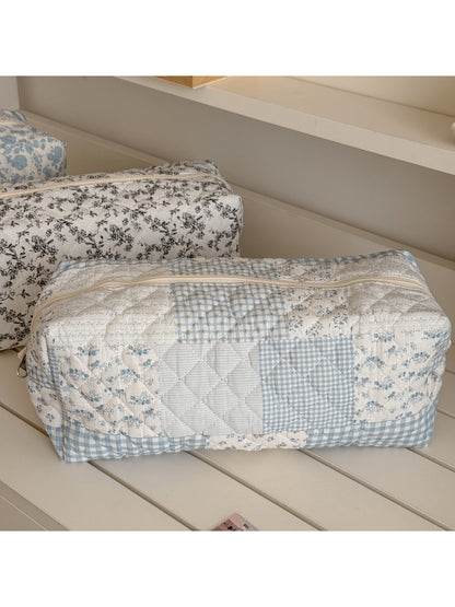 Cosbai cosmetic pouch open showing spacious interior with floral design