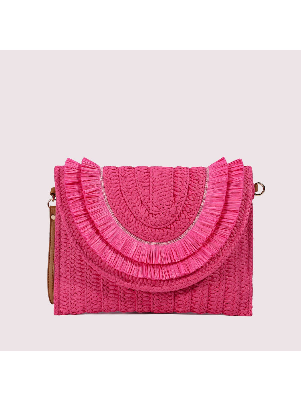 Cosbai clutch bag with tassels arranged to highlight craftsmanship