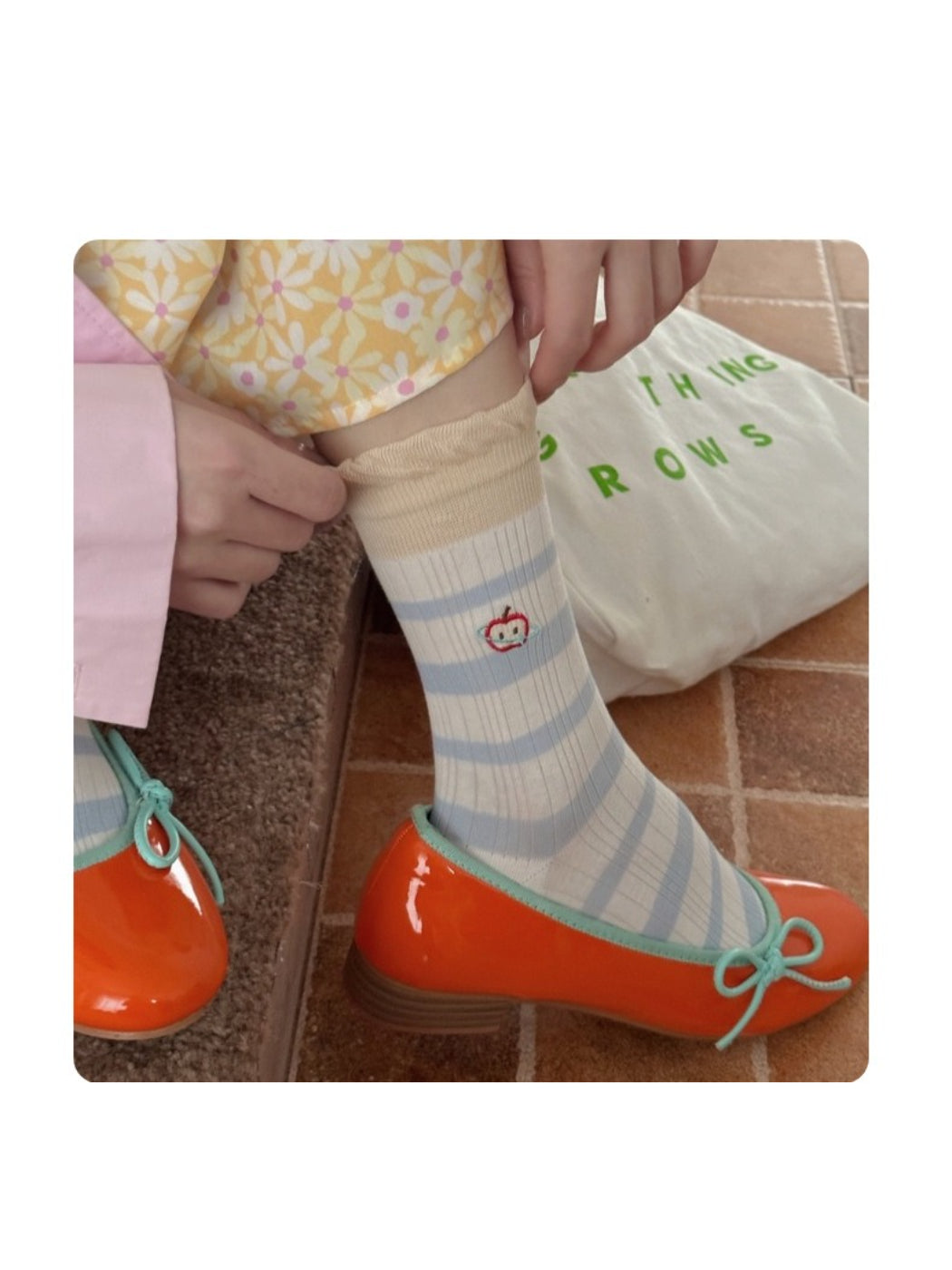 Rufia embroidered lace mesh mid-calf socks styled with shoes on a model