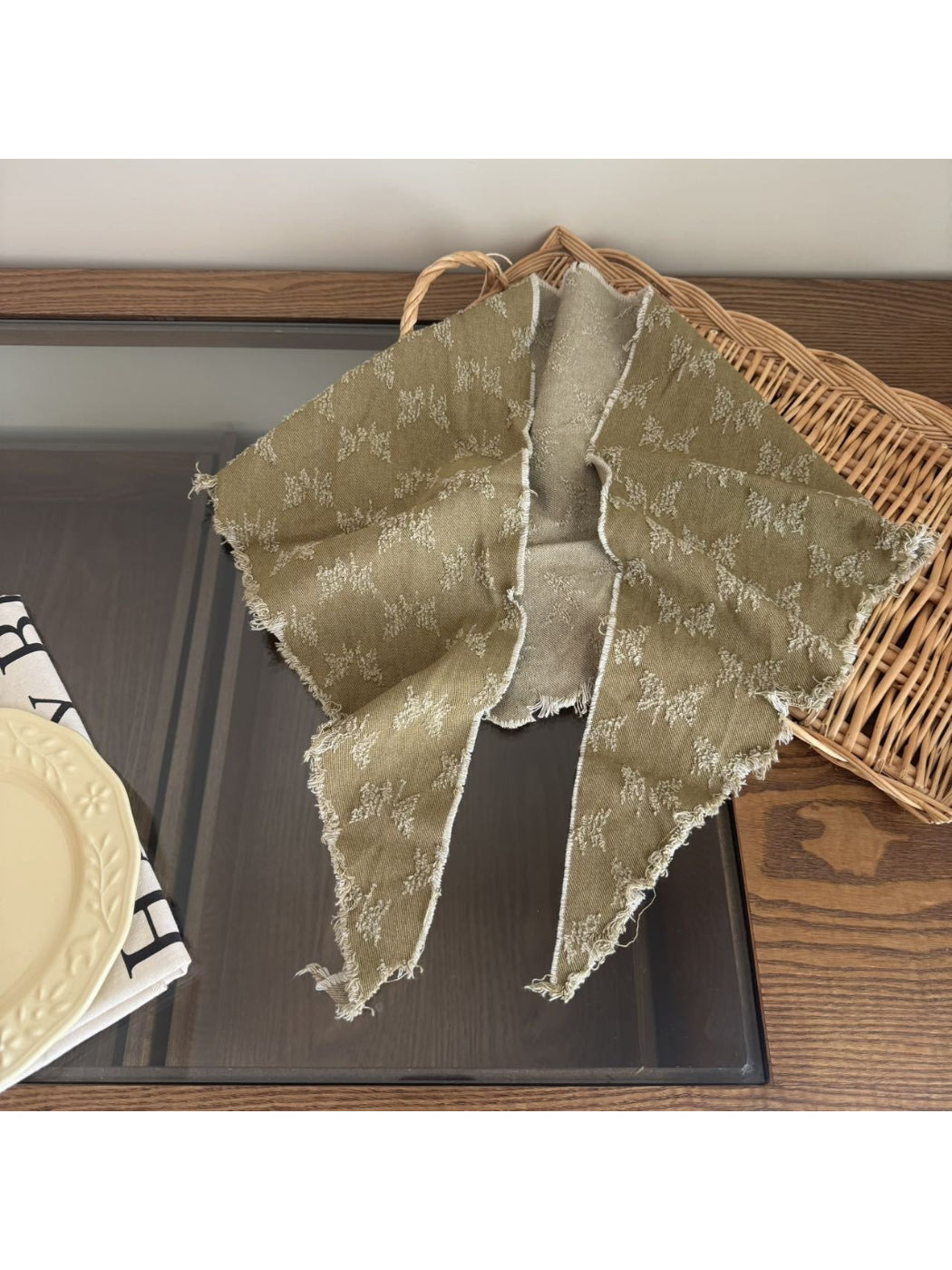 Flat lay of Scarvii frayed floral bandana scarf displaying full floral design and texture
