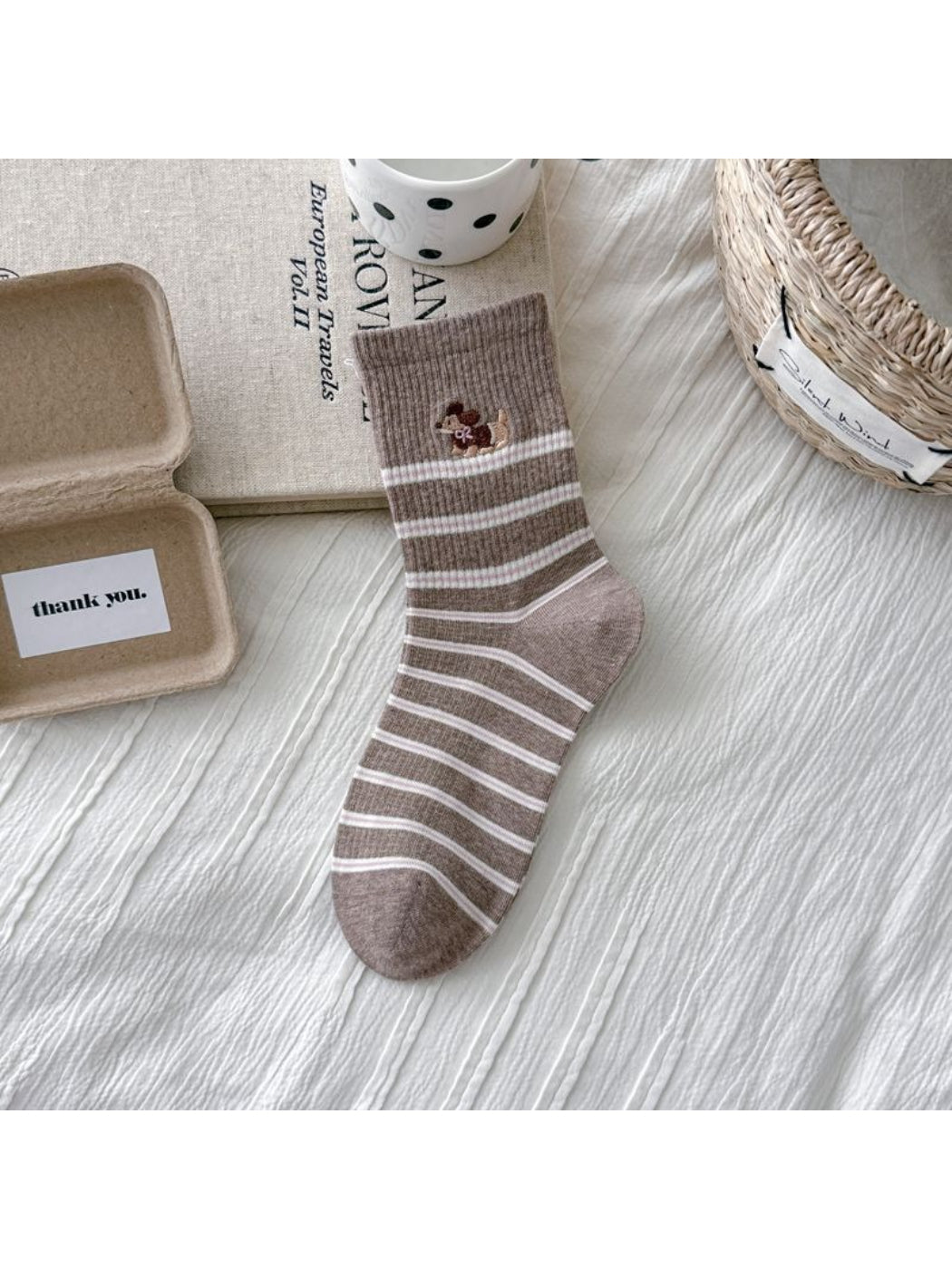 Rufia dog embroidered stripe crew socks shown from top angle