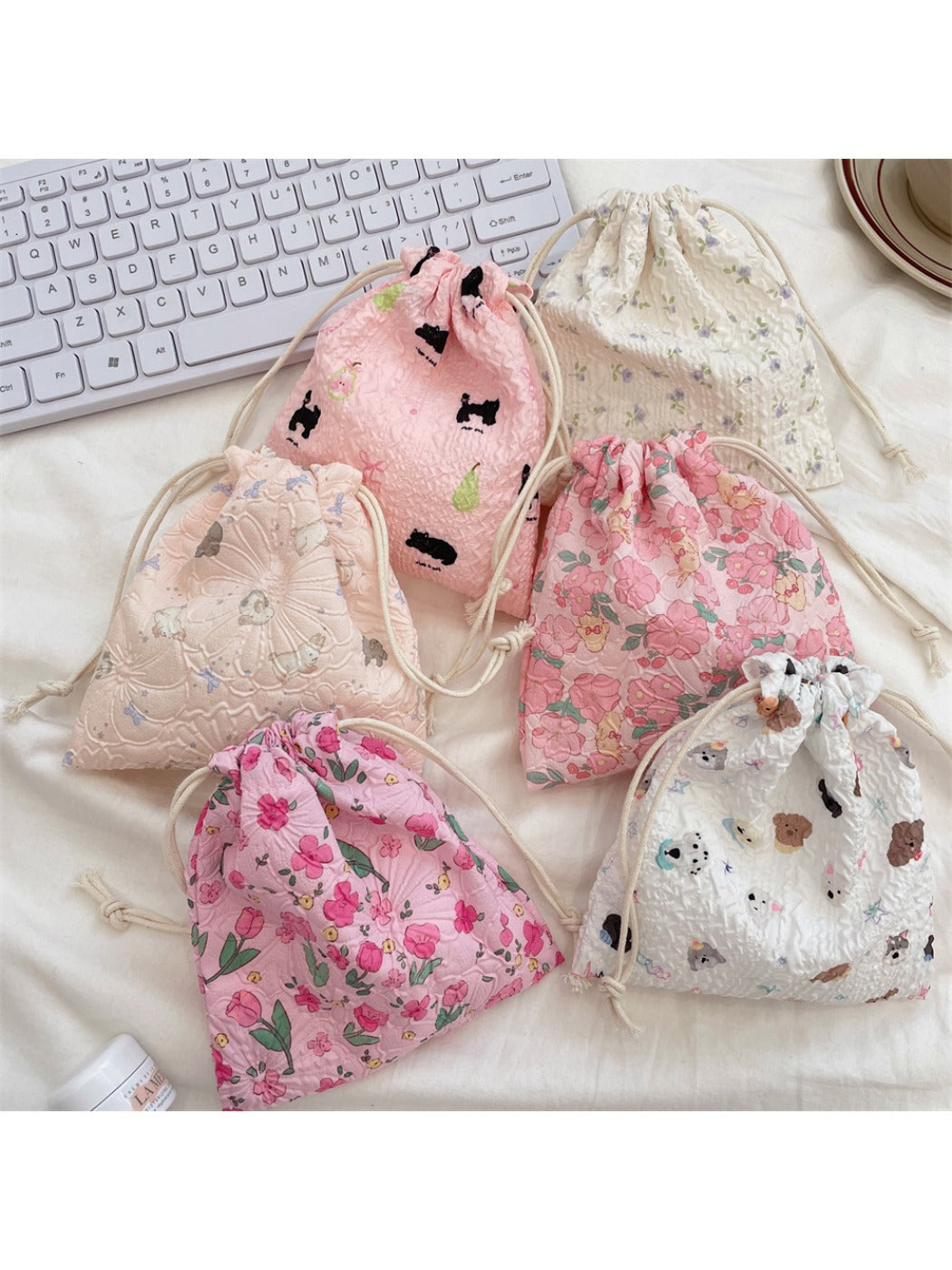 Cosbai cartoon drawstring pouch partially open with visible drawstring cords