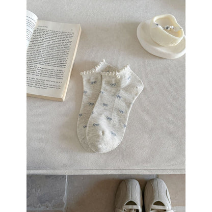 Packaging of Rufia bow motif no show socks with branding and product information
