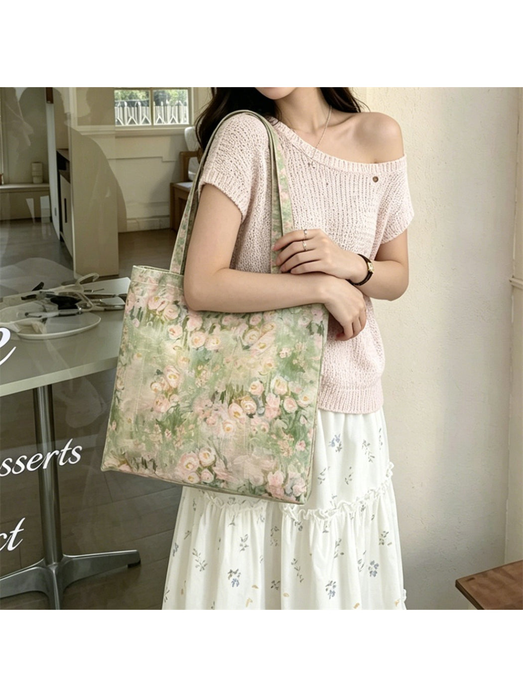 Blush floral shoulder tote bag styled with casual outfit on model