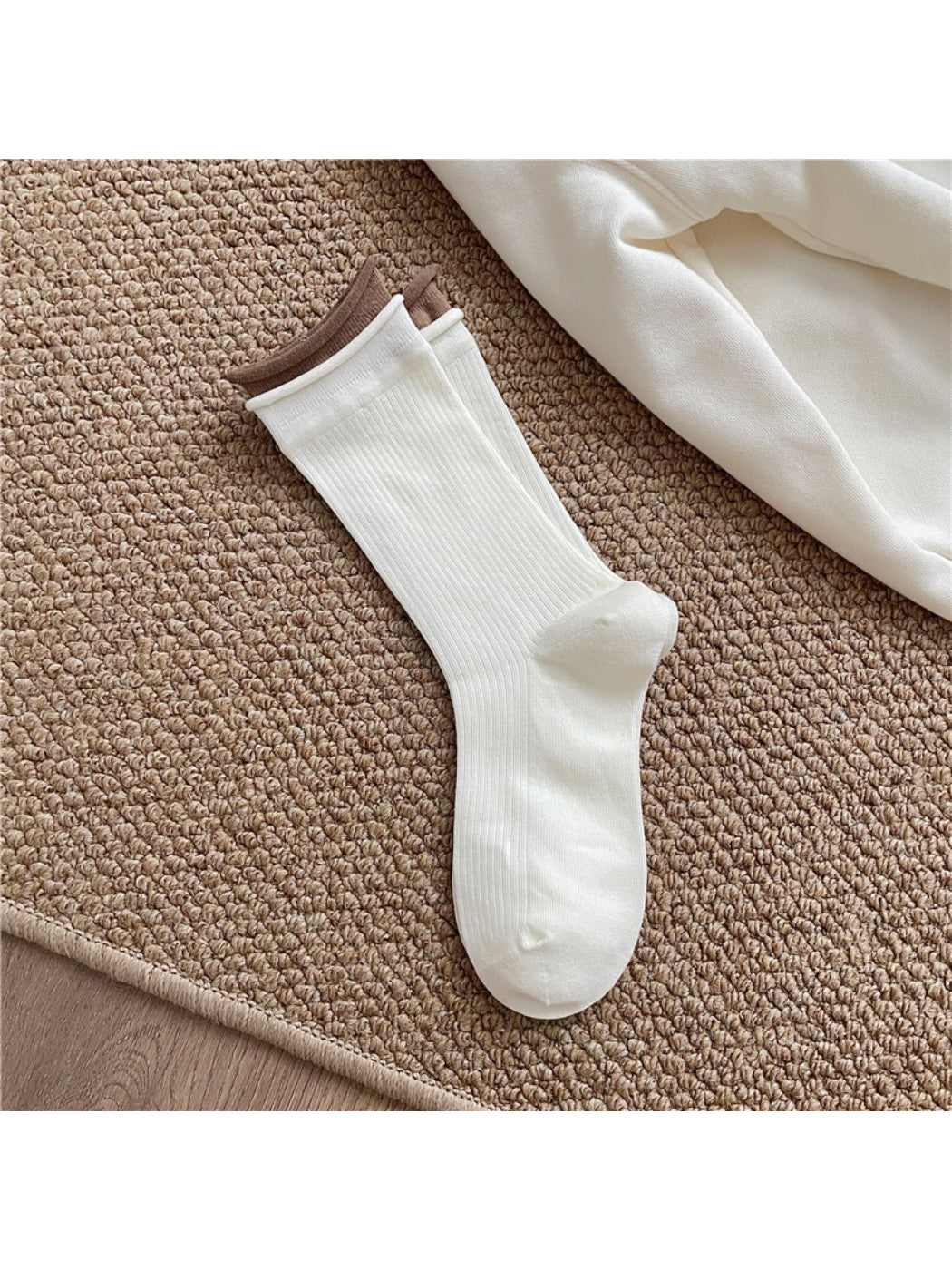 Side view of Rufia casual roll cuff crew socks showing cuff detail