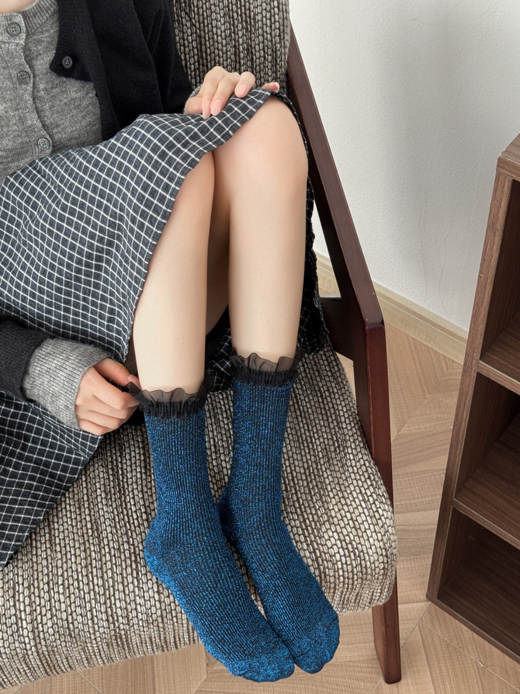 Rufia blue sparkle trim crew socks styled with Mary Jane shoes