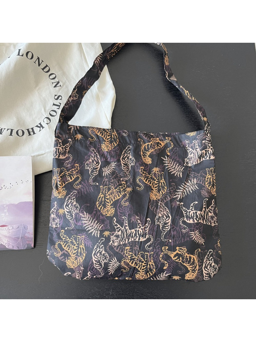 Cosbai Tiger Print Slouch Shoulder Bag styled with casual outfit on model