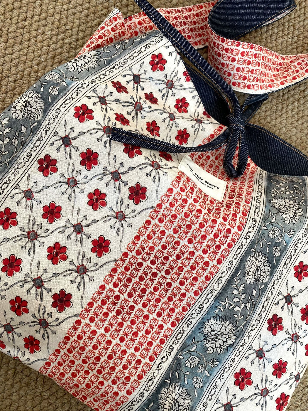 Back view of Cosbai reversible patchwork slouchy shoulder bag