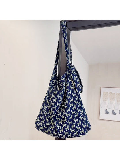 Close-up of blue zebra print fabric on Cosbai tie shoulder bag
