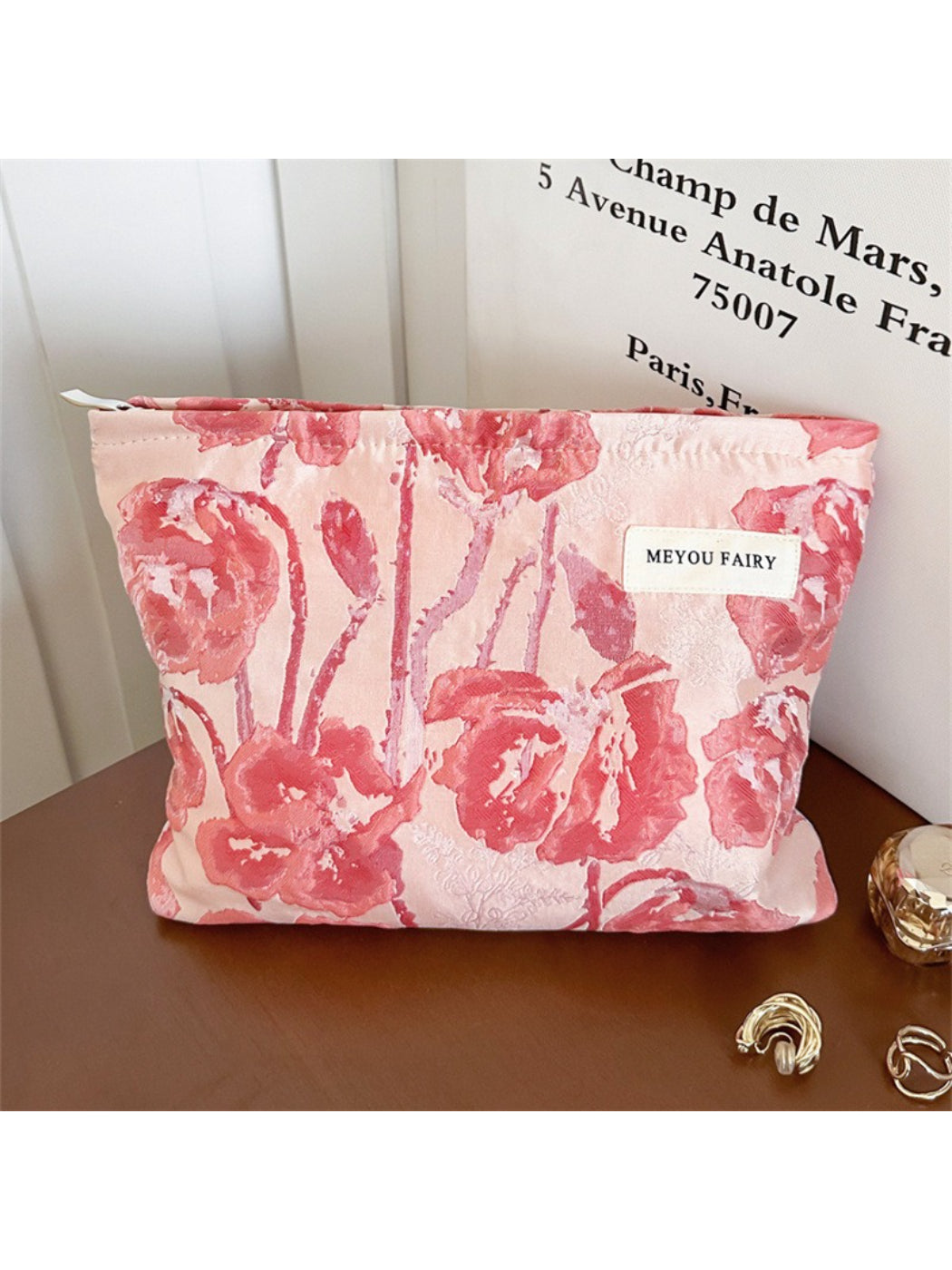 Cosbai cosmetic bag showing and floral artwork detail