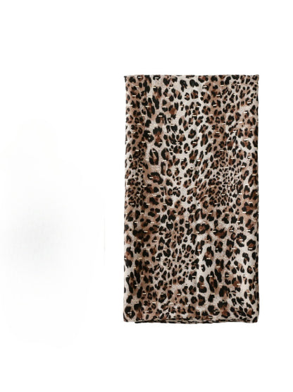 Close-up of Scarvii leopard pattern scarf fabric showing texture and colors