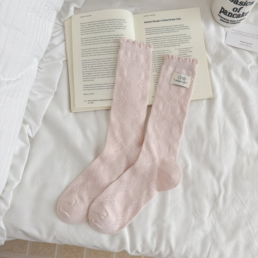 Rufia Fine Stripe Charm Crew Socks displayed with packaging and branding visible