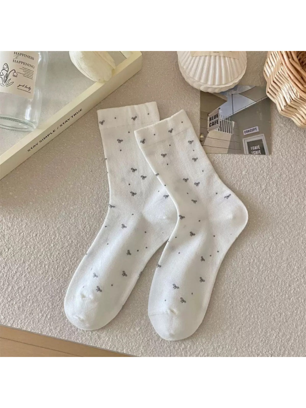 Top view of Rufia heart butterfly plaid crew socks
