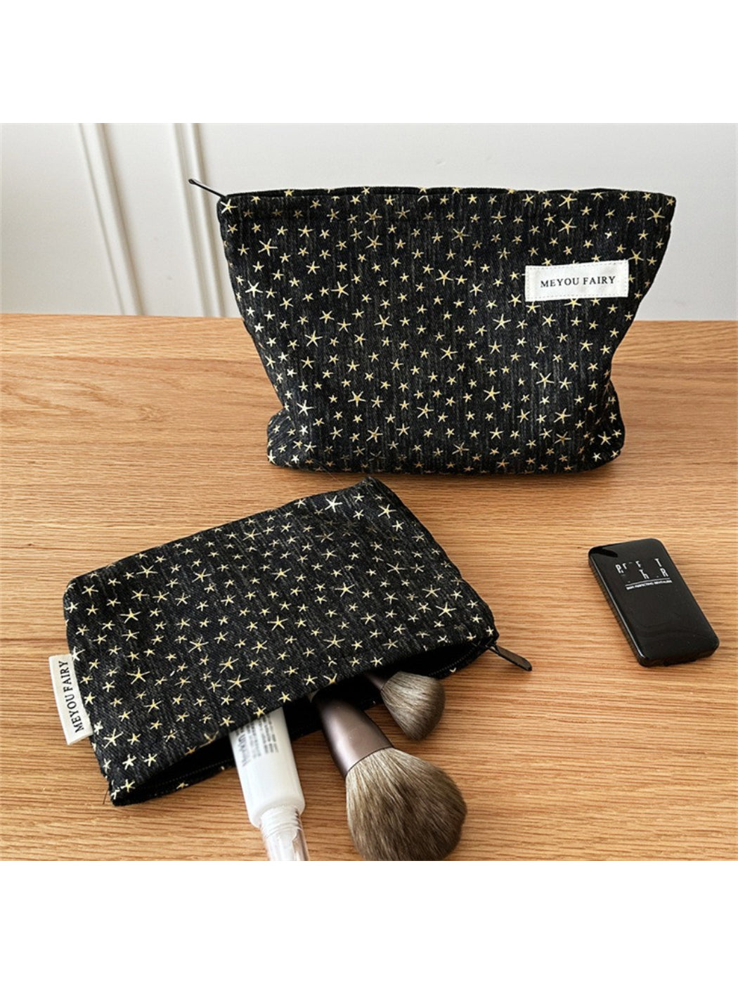 Cosbai Black Star Cosmetic Bag front view with star design on black background