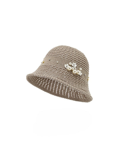 Haila bucket hat with visible beaded flower embellishment from an angle