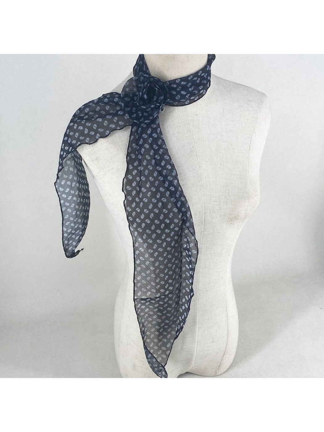 Model wearing vintage polka dot rose neck scarf styled with casual outfit
